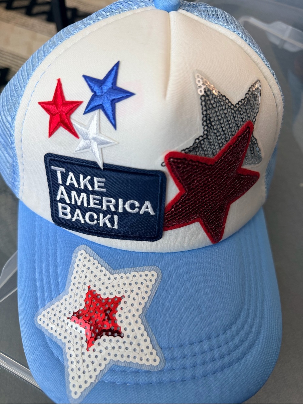 Patriotic Star Patch Trucker Hat in Light Blue, White, Red, Blue